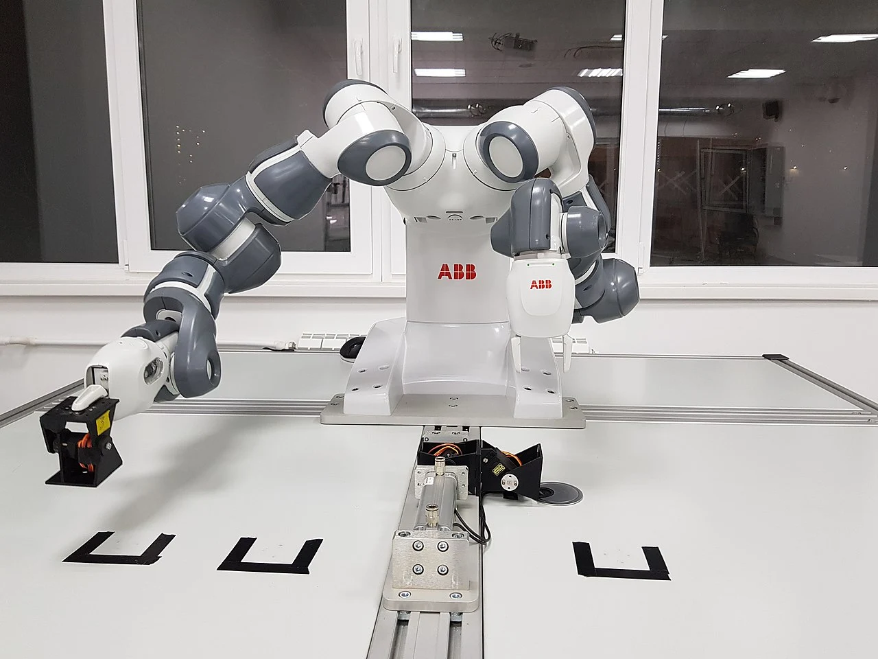 An ABB dual-arm robot in a robotics laboratory