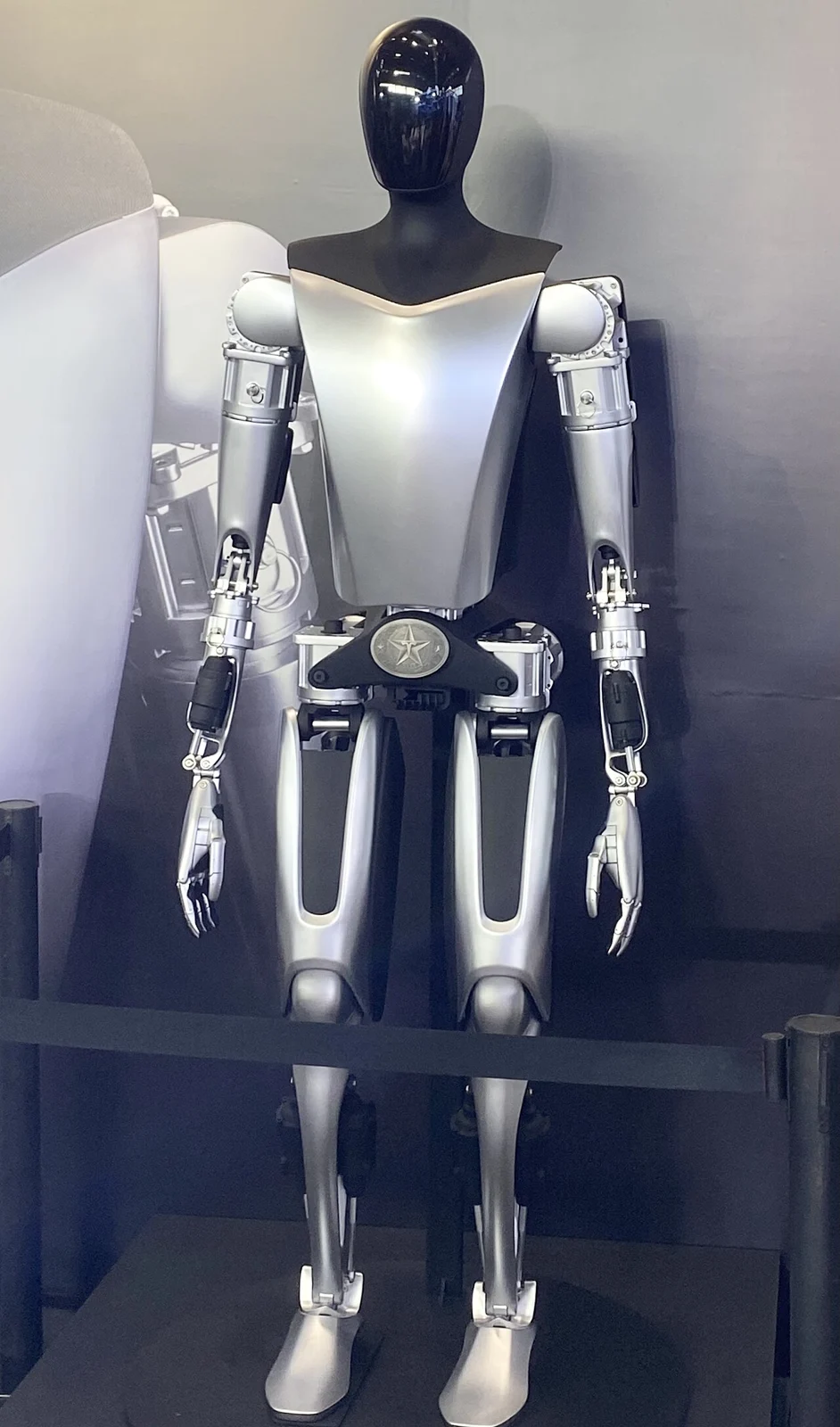 A Tesla Optimus humanoid on display