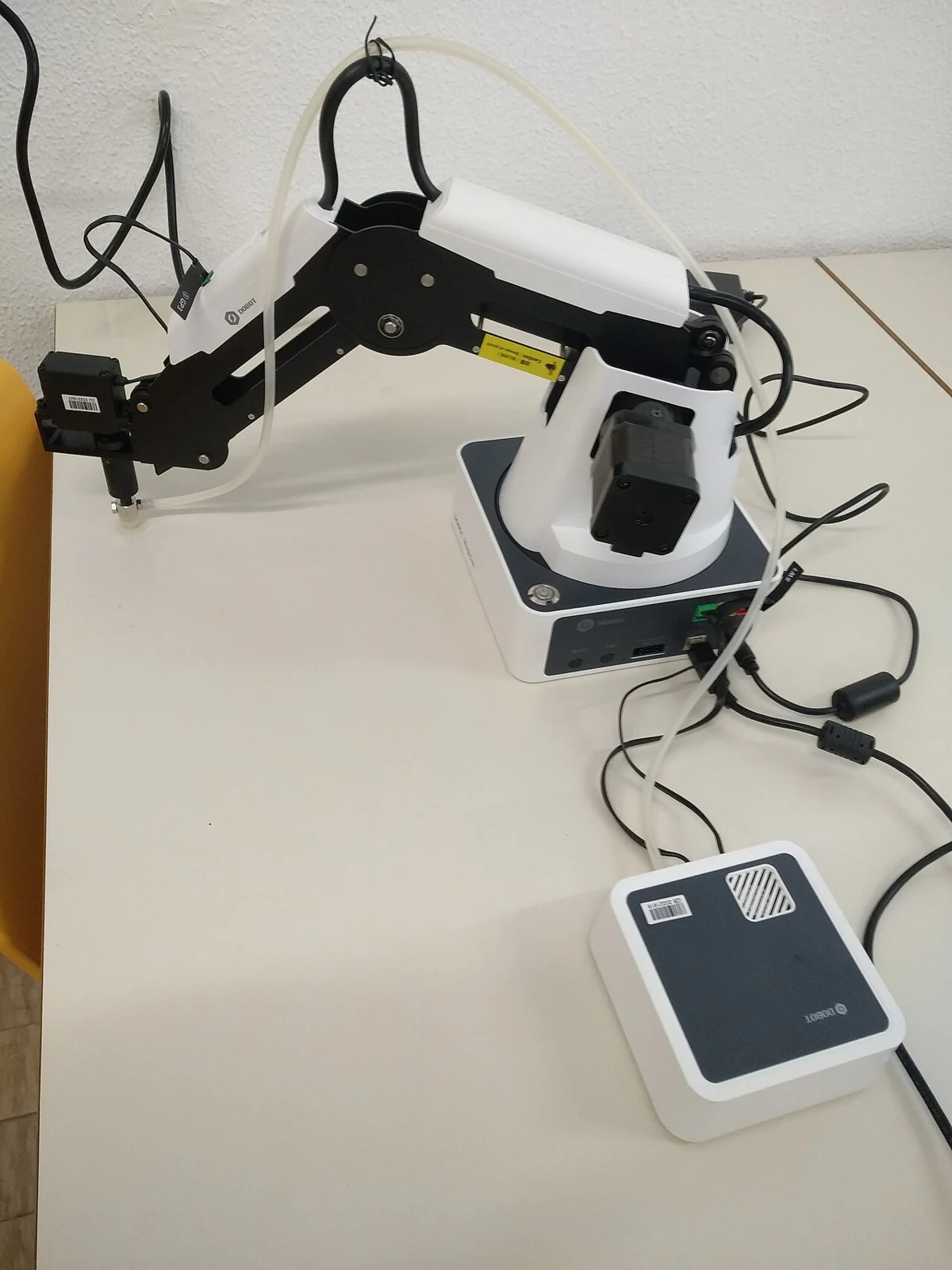 Dobot Magician robot arms in a laboratory